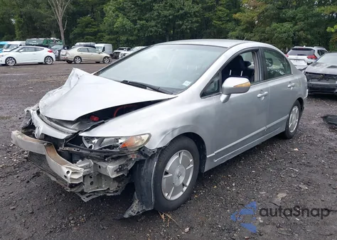 2006 Honda Civic Hybrid from USA, damaged, VIN JHMFA36216S013613